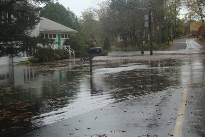 Five Mile River Road in Darien floods during Hurricane Sandy. 