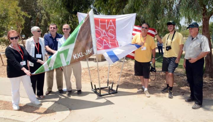 A group representing Hadassah Solidarity Mission planted trees in Israel to honor fallen soldiers in the recent conflict.