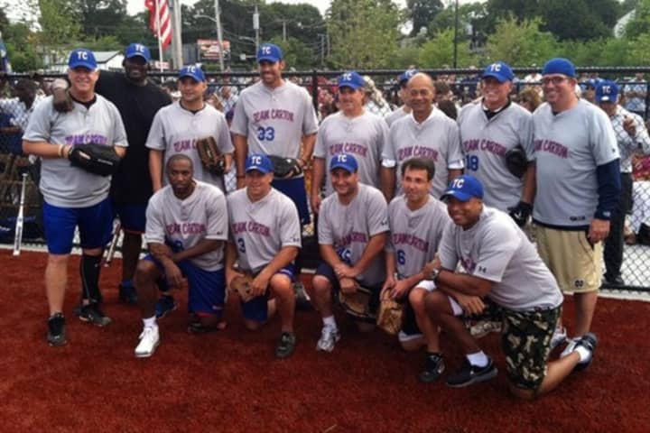 The celebrities lining up at the inaugural softball game in 2012.
