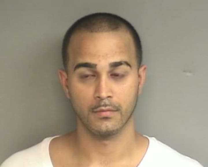 Eric Leon, 31, of Ozone, N.Y., charged with brandishing a pellet gun at Stamford store.