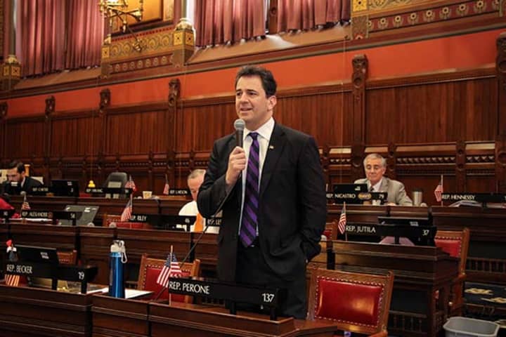 Rep. Chris Perone debates a bill in the House Chamber.