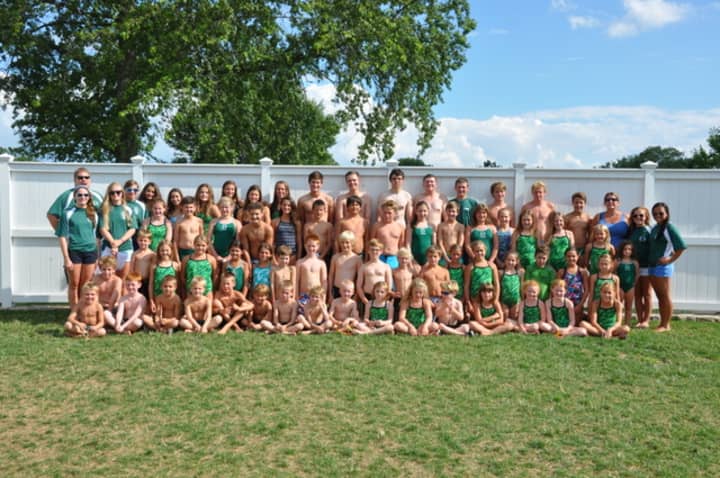 The Country Club of Darien swim and dive team finished an undefeated season and secured a division championship recently. 
