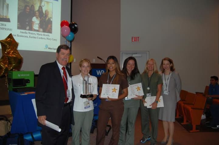 The Radiology team won the 2014 Step it Up Challenge with a cumulative total of more than 6 million steps taken during the eight week competition.  The five members of the winning team each received an iPad mini at the awards celebration. 
