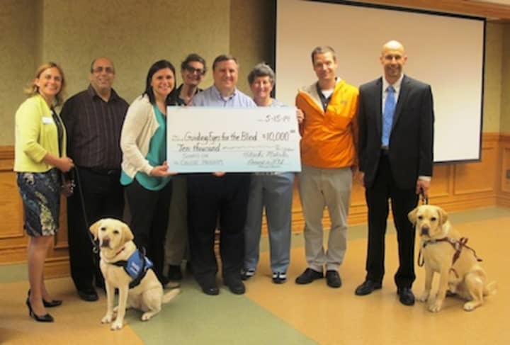 Guiding Eyes for the Blind received a $10,000 grant from Hitachi Metals America Ltd.s local Community Action Committee. The grant will be used to fund the organization&#x27;s Sights on College program, which provides guide dogs for students. 