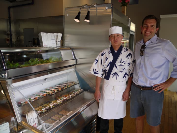 Owner Jim Thistle with one of his sushi chefs at the Westport Fjord Fish Market location off the Post Road. 