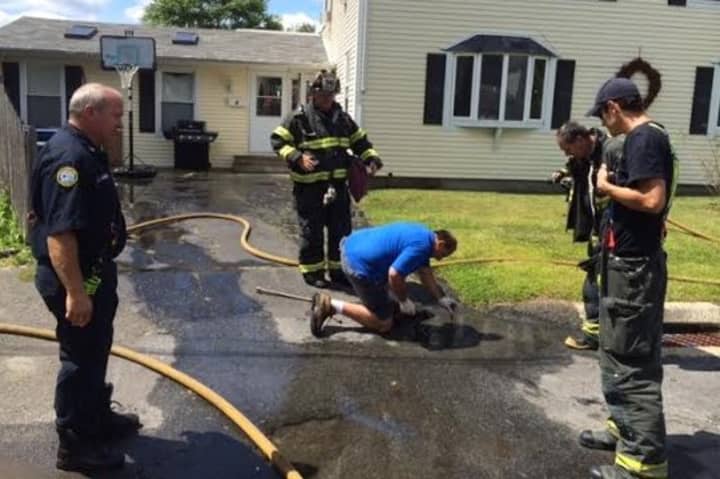 Assistant Chief Schuyler Sherwood, Lt. Lee Corbo, Andy Darrow and Brian Madia were among the Fairfield Fire Department members who responded to the report of a gas leak on Monday, Aug. 18. 