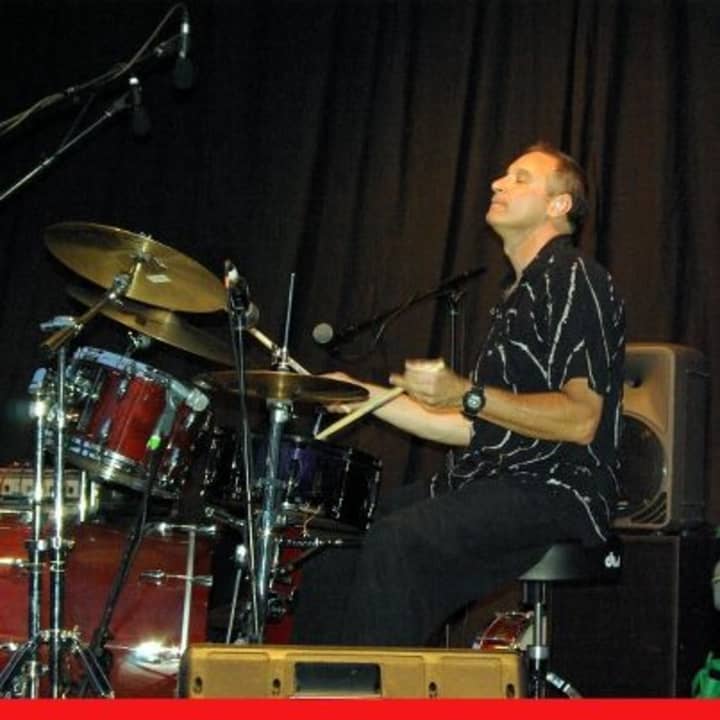 Andy Polay is on drums for the Andy Polay Trio,