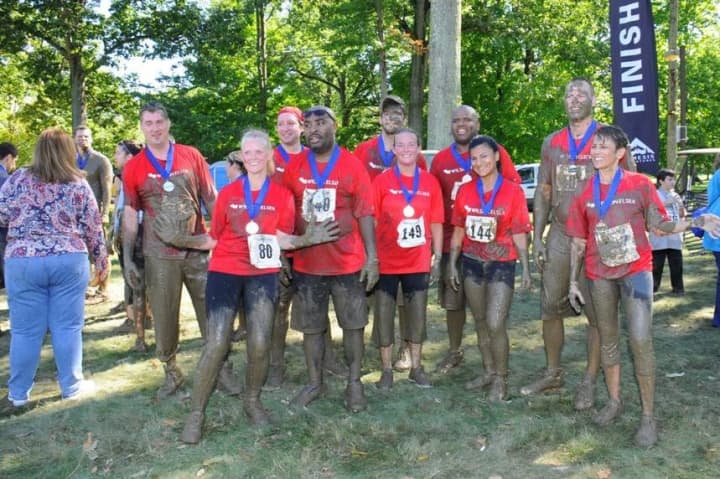 Muddy runners from Team Wilson Elsner gathered for a group photo after last year&#x27;s Trauma Mud Run at Westchester Medical Center.