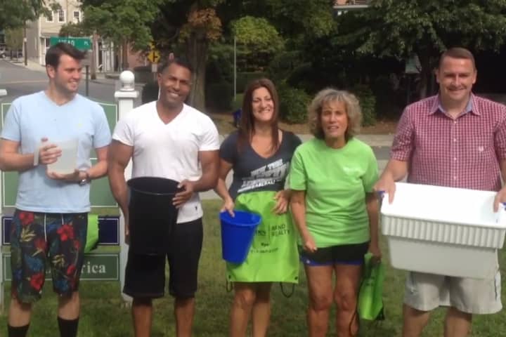 Better Homes and Gardens Rand Realty employees, left to right, Julian Diaz, Billy Ponce, Sandy Stemlach, Arlyne Ashkinos and Don Heithaus recently took part in the ALS Ice Bucket Challenge.