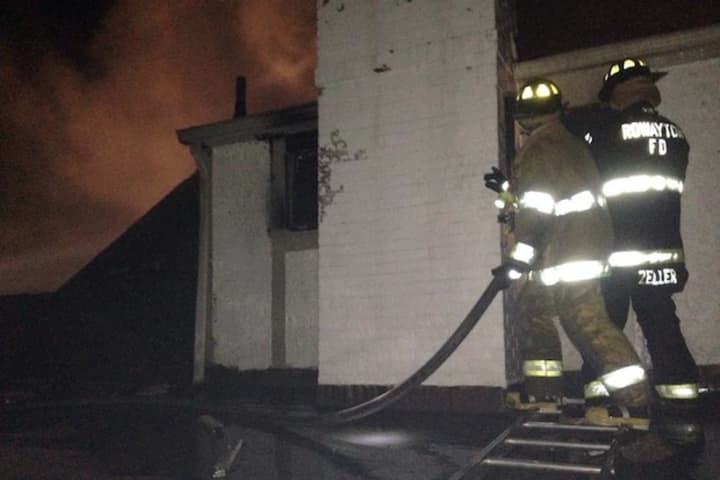 Rowayton firefighters spent three hours battling a blaze on Witch Lane Thursday night.