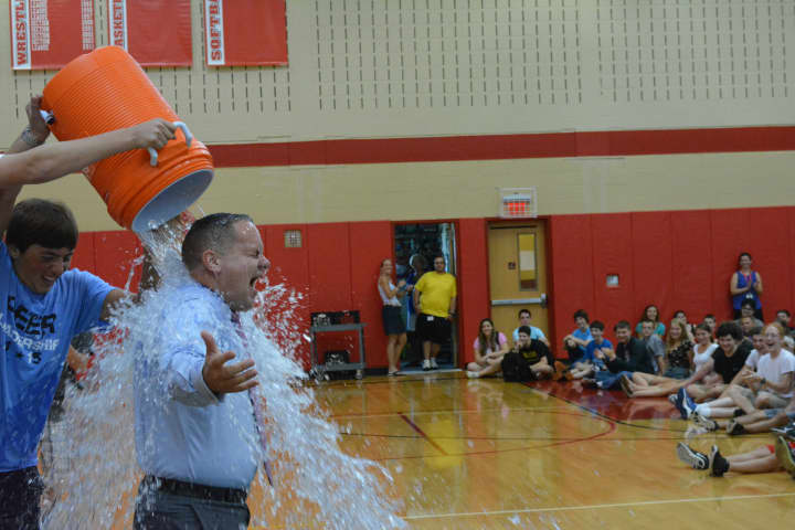 Somers High School Principal Mark Bayer participates in the Ice Bucket Challenge.
