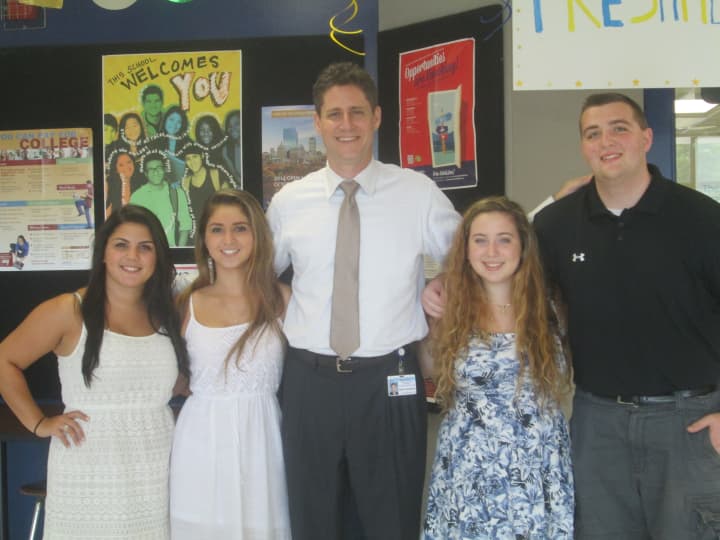 Seniors at Walter Panas, pictured with interim principal Phil Kavanaugh, said they are excited for their senior year.
