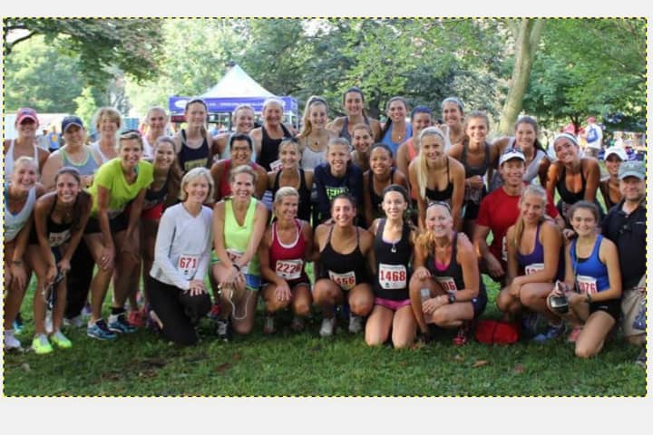 Teammates from Norwalk-based Connecticut Boat Club and parents ran Monday in road races in New Haven.