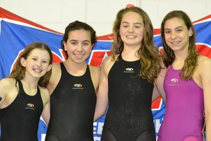 Greenwich Dolphins swimmers (left to right) Meghan Lynch, Taylor Schinto, Emmy Sammons and Kate Hazlett were among the team members that had top finishes in events this summer. 