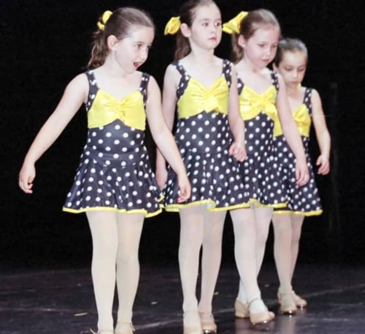 A quartet of young tap dancers perform at Dance Adventures staged recital at Palace Theater: