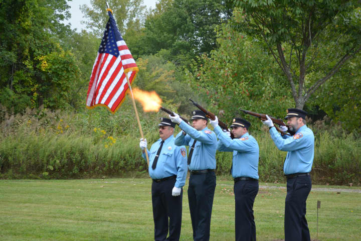 Pound Ridge firefighters perform a fusillade at the town&#x27;s 9/11 memorial service.