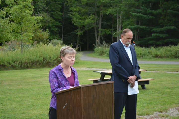 Pound Ridge Community Church Pastor Lori Miller speaks at the town&#x27;s 9/11 anniversary event.
