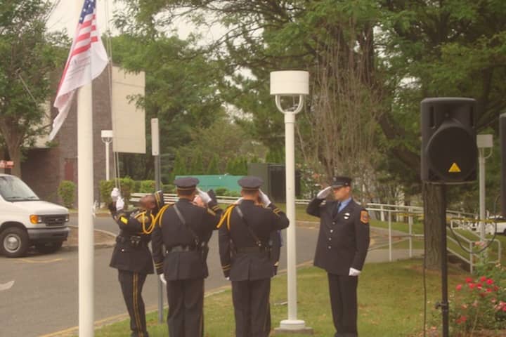 Members of the Norwalk Fire and Police Joint Honor Guard post the colors during the city&#x27;s Sept. 11 tribute Thursday morning.