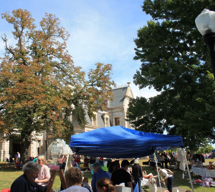 Visitors browse around the vendors at the Lockwood-Mathews Mansion Museum&#x27;s 2013 Old-fashioned Flea Market.