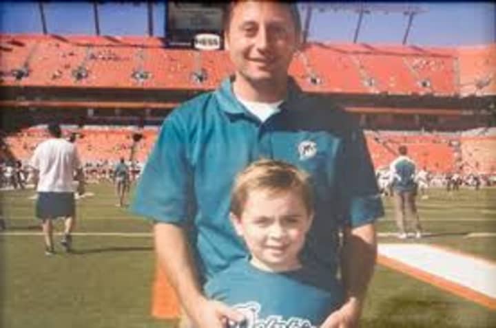 Rob Astorino shot back at an attack ad that digitally removed his son, Sean, from this photo. 