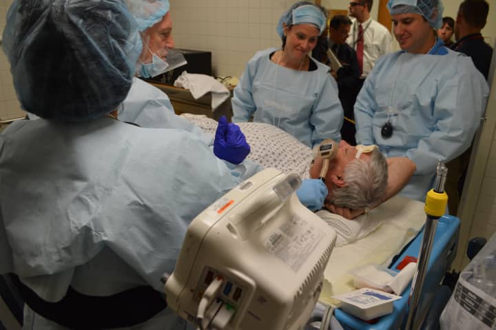 Hudson Valley Hospital workers treat a &#x27;patient&#x27; during a recent drill with Entergy workers.