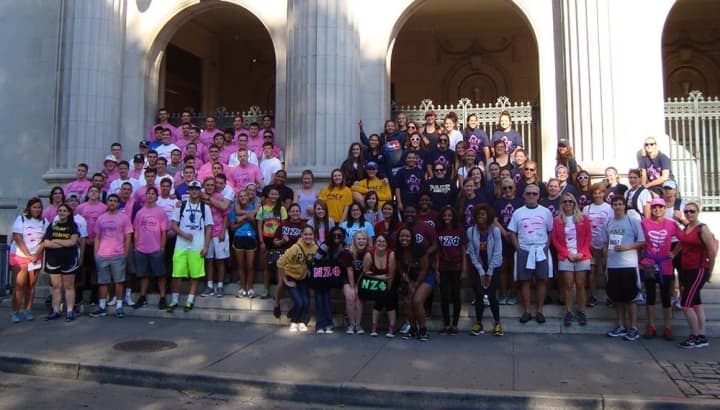Pace University athletes and students participate in Susan G. Komen walk. 
