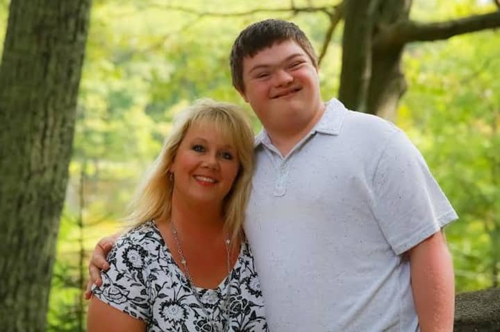 Danbury Realtor Kim Gifford, left, with her son, Peter, says raising a child with Down syndrome has had a profound positive impact on her life. 