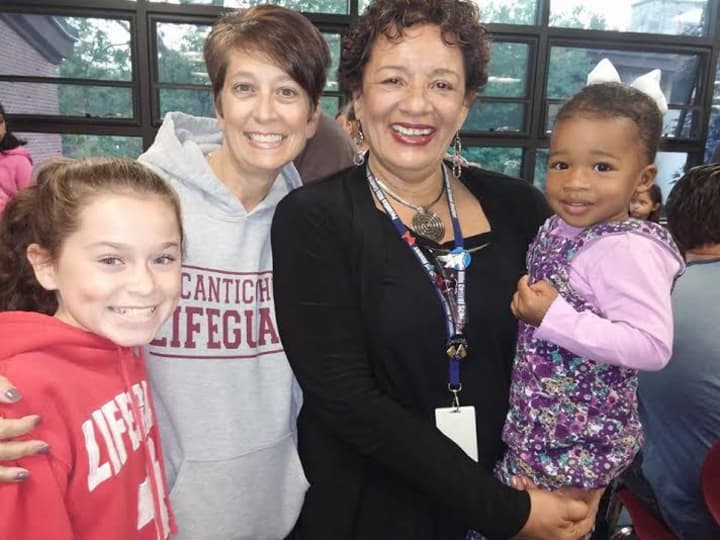 Pocantico Hills School Superintendent Valencia Douglas, right, and her granddaughter, District Clerk and Secretary Gina Downes, left, and her daughter at the PTA Pasta Dinner Friday, Sept. 19.