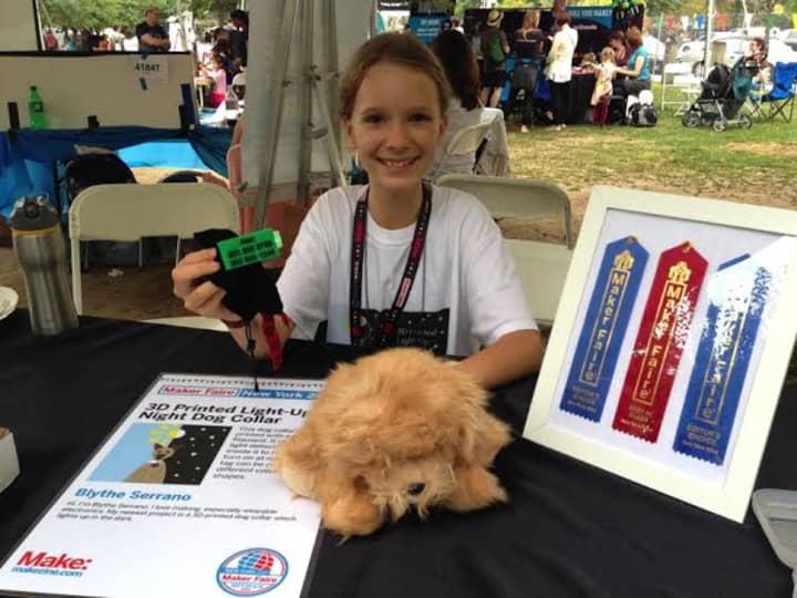 Blythe Serrano, 11, of Norwalk, wins an Editor&#x27;s Choice award for a light-up pet collar she displayed at the World Maker Faire 2014 in New York.