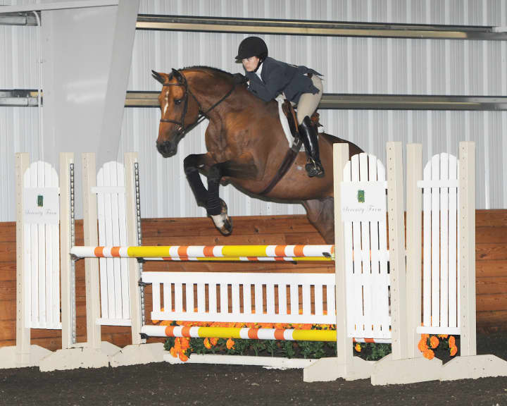Darien resident Courtney Plutte participates in the Maclay Regional equitation finals.