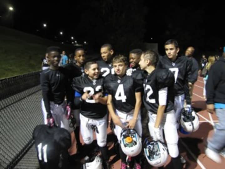 White Plains Tigers Football wins against Scarsdale Raiders. 