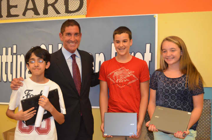 State Sen. Jeff Klein delivers Chromebooks to Pelham students, made possible by a $100,000 grant. 