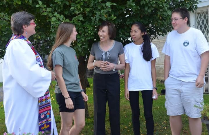 Teen members of the United Methodist Church of Mount Kisco discuss the pastor&#x27;s Sunday prayer message of resisting alcohol and drug use with Dr. Nan Miller, coordinator of 