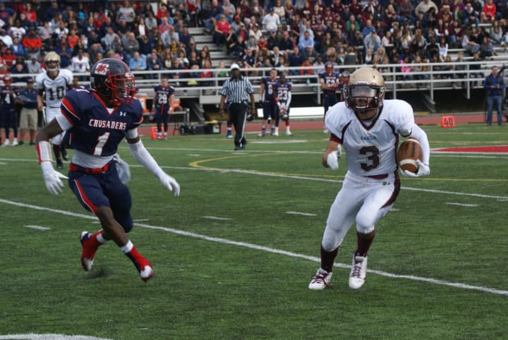 Iona Prep&#x27;s Dylan Mucci tries to outrun an Archbishop Stepinac defender during a game last year.
