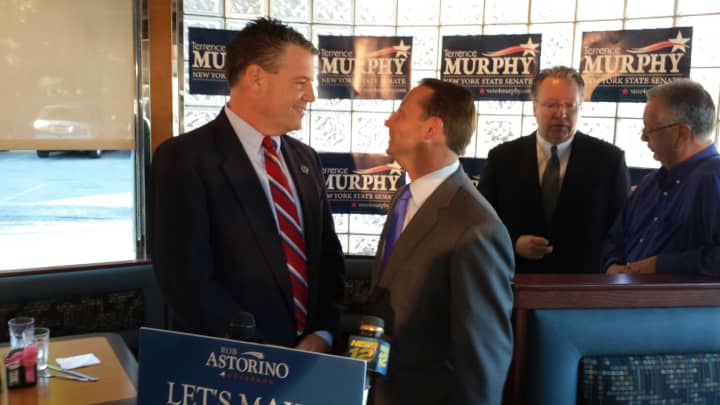 County Executive Rob Astorino,shakes hands with state Senate candidate Terrence Murphy of Yorktown, left, at the Thornwood Diner.