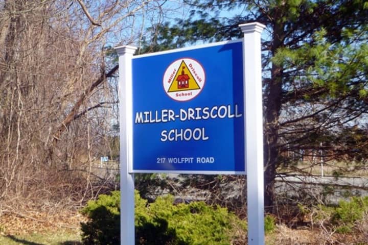 A former aide at the Miller-Driscoll School in Wilton has pleaded not guilty to charges in a child porn case. 
