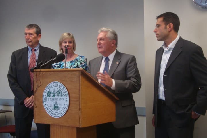 Norwalk Mayor Harry Rilling, alongside Brian Baxendale, Liz Stocker and Adam Blank, announces new initiatives to improve business development and zoning in the city.