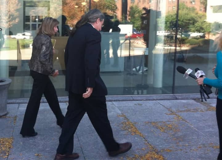 Stamford High Assistant Principal Roth Nordin, left, walks out of the Stamford court house with her lawyer Norm Pattis by her side. She and principal Donna Valentine are charged with failing to report a teacher&#x27;s sexual relationship with a student.