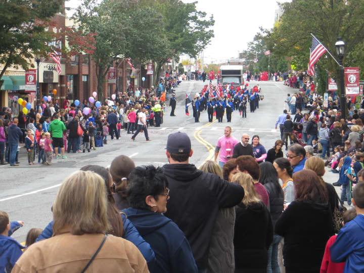 Parade goers looking down Halstead Avenue from the corner of Harrison Avenue.