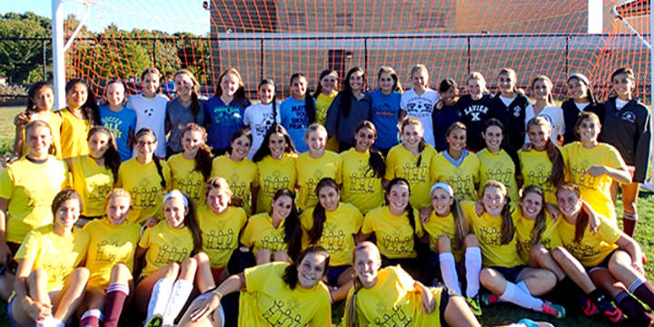 Harrison High School soccer players volunteered in Recipes for Hope.