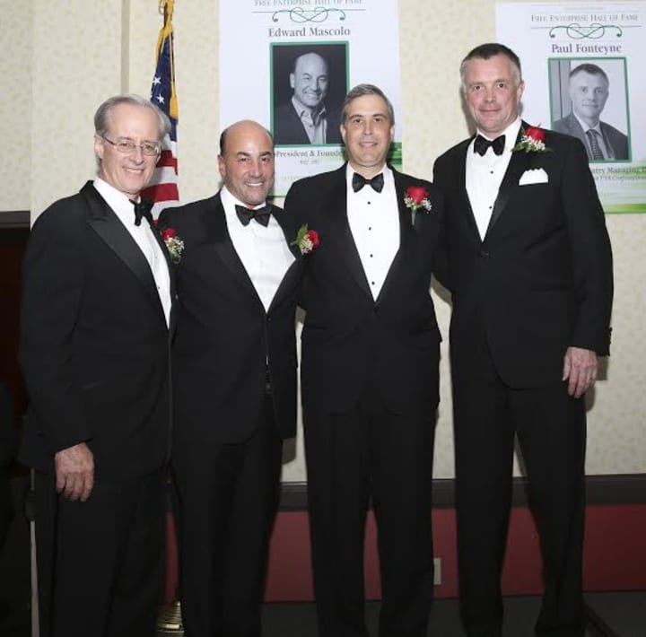John Ciulla, Paul Fonteyne, Edward Mascolo, and Thomas Santa are inducted into the Junior Achievement of Western Connecticuts Dr. George R. Dunbar Free Enterprise Hall of Fame. 