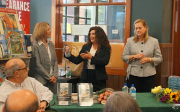 Teachers from the Lakeland school district discussed their book at an educator reception. 