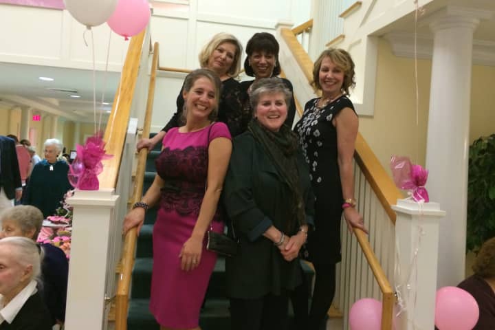 The team of Atria Darien and Helen Ainson fashions pose after the event.