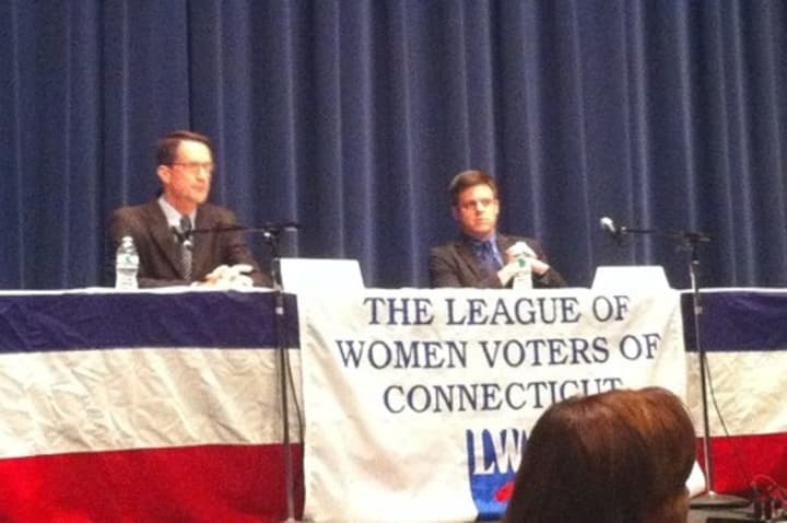 Democrat Jim Himes and Republican Dan Debicella meet in a debate at Wilton High School Sunday.