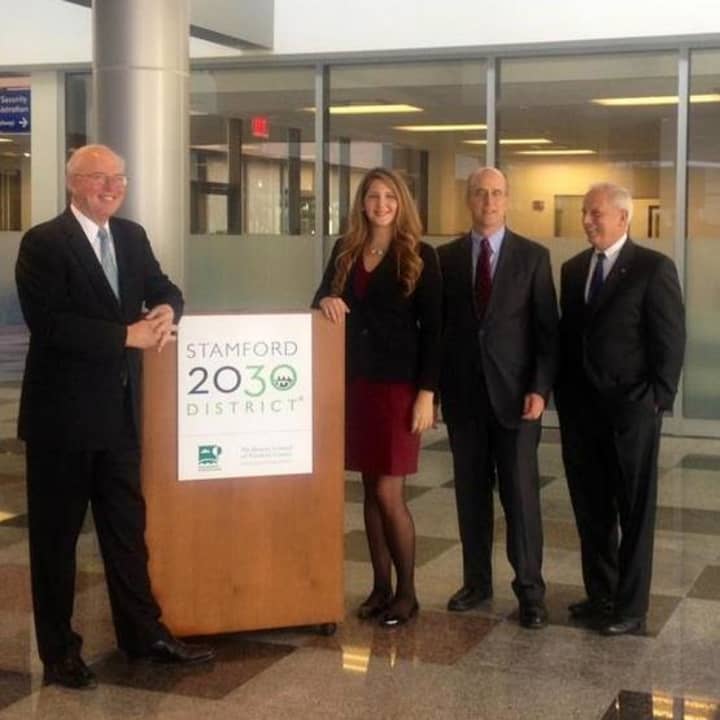 Megan Saunder, executive director of Stamford 2030, second from left, is joined by Don Strait, president of CFE, third from left,  and other founding partners at the launch in Stamford.