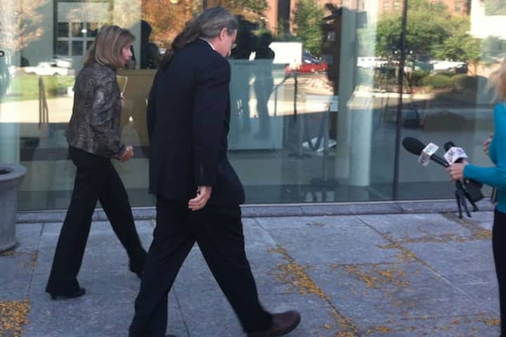 Stamford High Assistant Principal Roth Nordin, left, walks out of the Stamford court house with her lawyer Norm Pattis by her side earlier this month. 