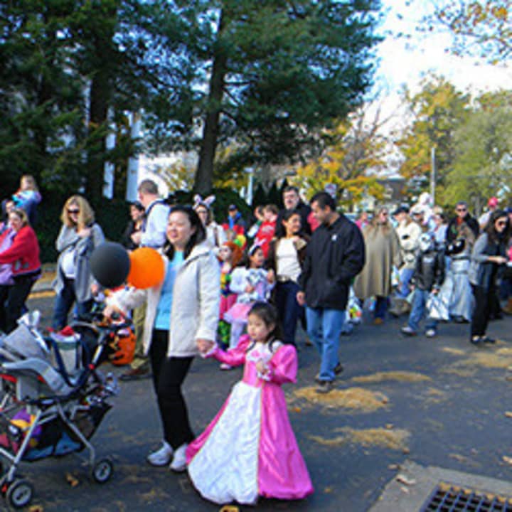 New Canaan residents enjoy the 2012 Halloween Parade. This year&#x27;s is on Oct. 26. 