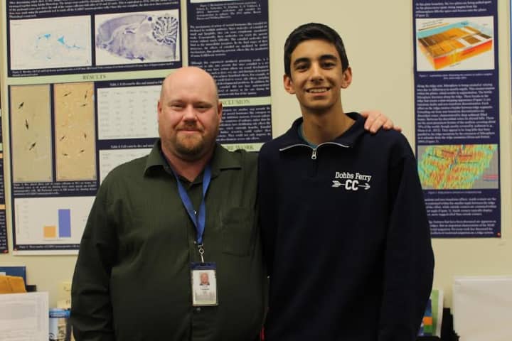 From left: Dobbs Ferry Science Research teacher Tom Callahan and Yiorgos Argyros, a semifinalist in the 2014 Siemens Competition. 