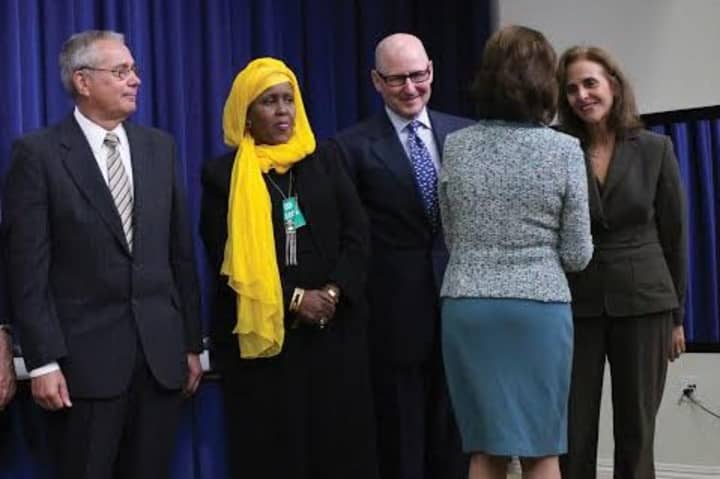 Teresita Wisell of White Plains, right, an administrator at Westchester Community College, was honored at the White House for her role as a &quot;Champion of Change&quot; on Wednesday.