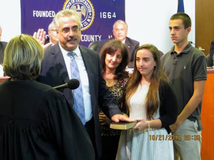 New Eastchester Town Justice Fred Salanitro being sworn in in front of the Board of Trustees on Tuesday.